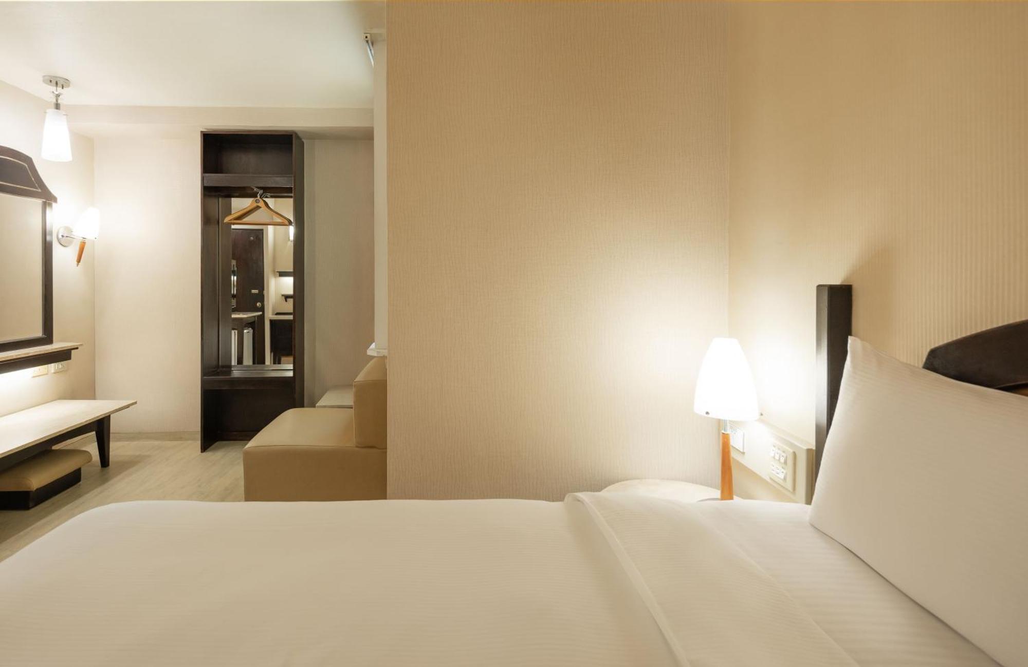 Kindness Hotel Weiwuying Гаосюн Номер фото